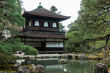 concept of Travel and landmarks Kyoto, Japan. Beautiful Architecture at Silver Pavilion or Ginkakuji temple on the background of the Japanese forest. winter. Buddhism