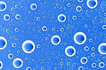 fresh drops background blue glass / wet rainy background, water drops transparent glass blue