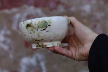 beautiful ceramic bowls in men 's hands