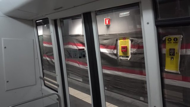 Underground Metro Train Doors Closing.