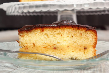 Chocolate Topped Sponge Cake with Prunes and Toffee Sauce