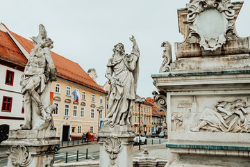 Fototapeta na wymiar Statues of the Plague Column on the main square of Maribor, Slovenia. Europe.