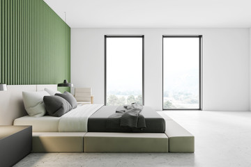 Green and white master bedroom, side view