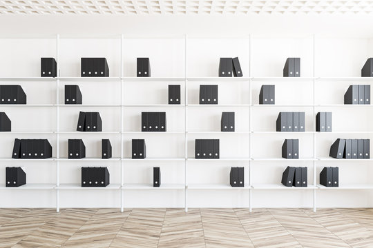 Bookcase with binder folders in white office