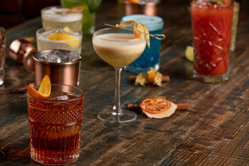 Many different multi-colored cocktails with different colors