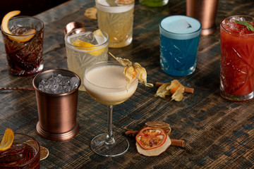 Many different multi-colored cocktails with different colors