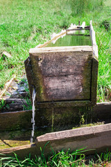 Fototapeta premium Watering trough in Beskids mountains, Poland.