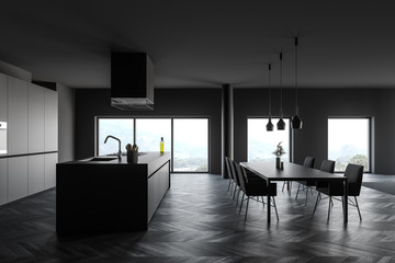 Gray kitchen interior with dining table