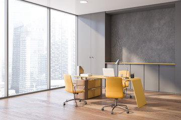 Gray boss office interior with yellow chairs