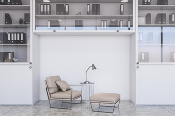 Beige armchair in white office lounge