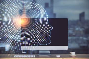 Double exposure of table with computer and brain hologram. Data innovation concept.