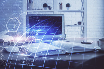 Multi exposure of table with computer and world map hologram. International data network concept.