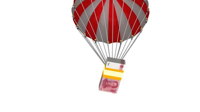 A pack of Chinese yuan is dropping by parachute. A pack of Chinese yuan banknotes flying on a parachute. Footage video