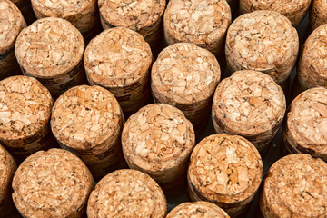 Background from textured wine corks, top view. place for text