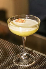 colored cocktails by the bar for people