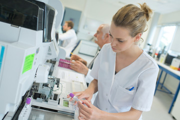 scientist working with blood sample in laboratory
