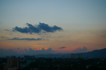 dramatic twilight sky above the city skyline