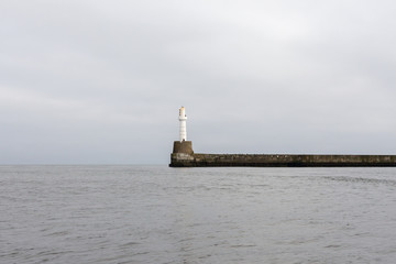 Lighthouse at South Breakwater at Aberdeen Harbour.