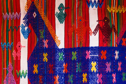 Traditional Mayan Guatemalan woven fabric with horse emroidery