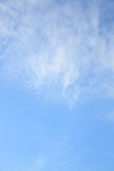 fluffy white cloud on clear blue sky