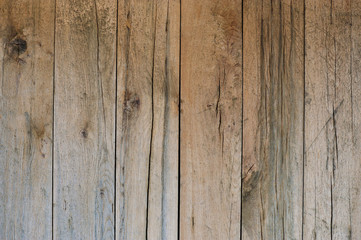 Old wooden wall or floor made out of raw colored planks