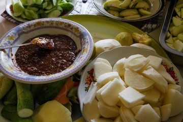  lotis buah or rujak. slices of fruit with peanut sauce and hot chili paste. indonesian traditional fruit salad