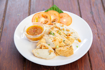 Sliced Chinese fish sausage with Thai spicy sauce
