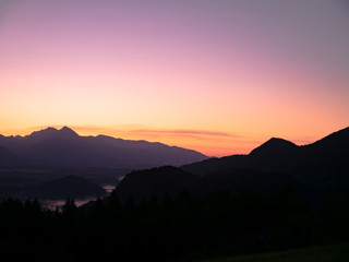 View on the beautiful sunrise over the majestic hills with the Lake Bled in Slovenia