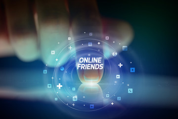 Finger touching tablet with social media icons and ONLINE FRIENDS