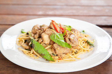 Spaghetti stir fried spicy thai pad ki mao chicken