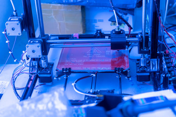 inovative 3d printer, creating details and models in scientific laboratory