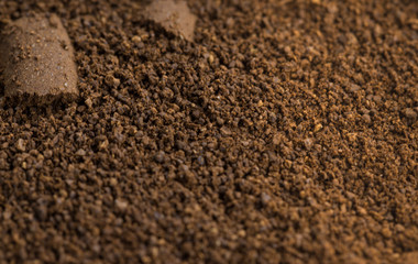 Ground coffee in close-up visible texture of details