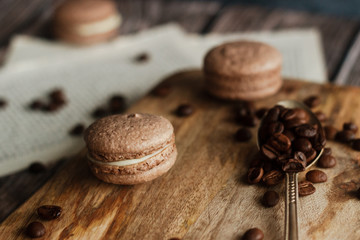 Macaroons. Delicious french dessert. Romantic composition with coffee and other elements.