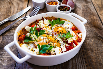 Shakshuka - fried eggs with vegetables