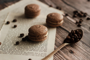 Macaroons. Delicious french dessert. Romantic composition with coffee and other elements.