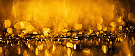 Water drops with golden highlights  