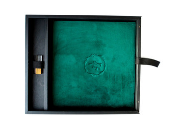 Beautiful Malachite wedding photobook and Usb flash drive in black wooden box. Wedding concept