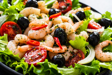 Prawn salad on black stone board