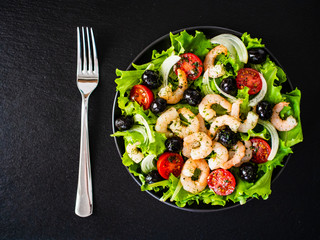 Prawn salad on black stone board