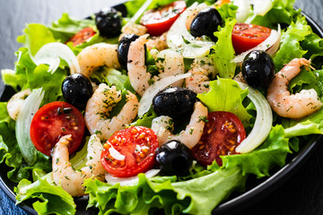 Prawn salad on black stone board