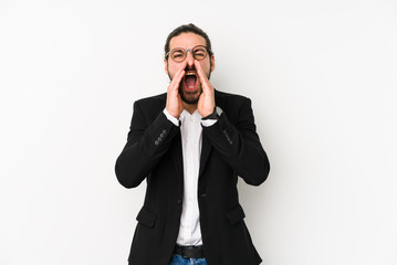 Fototapeta premium Young caucasian business man isolated on a white background shouting excited to front.