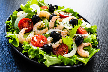 Prawn salad on black stone board