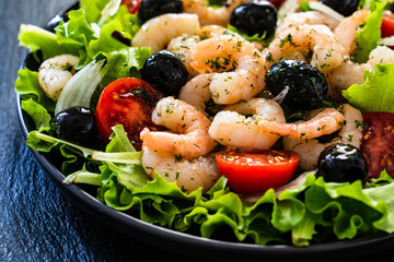 Prawn salad on black stone board