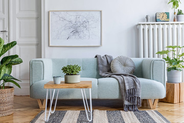 Stylish scandinavian living room interior with design mint sofa, furnitures, mock up poster map,...