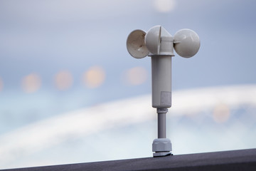 White mechanical wind speed and pressure sensor-anemorumbometer.