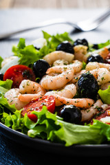 Prawn salad on black stone board