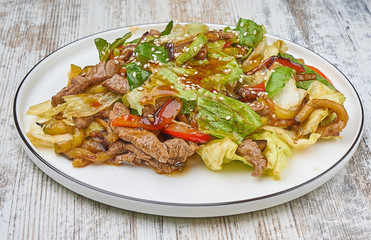 grilled beef warm salad with greens