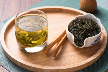 Organic green tea has a health preserving function. It's a hot drink that Oriental and Asian people like very much. It is also called Chinese tea