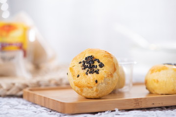 The delicious yolk is crisped in a wooden tray