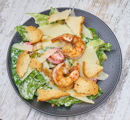 shrimp salad with greens and croutons